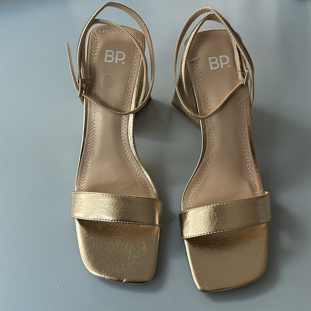 Brand BP, new condition- original box, Gold metallic color